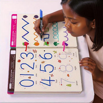 kind schrijft met oefenboek voor cijfers en letters